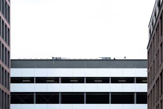 Minimal modern urban building architecture showing facade lines and frame with sky copyspace for clean design and geometric composition