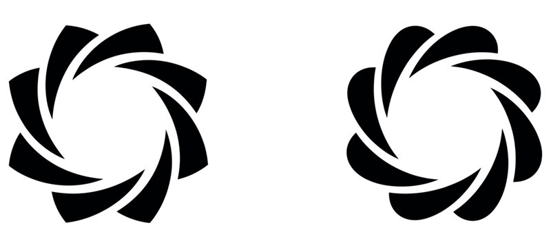 Two black abstract circular shapes resembling aperture blades on a white background.