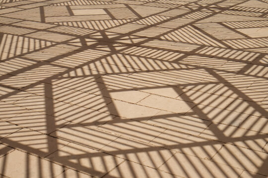 Geometric Shadow Pattern on Pavement