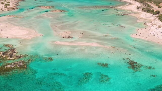 Greece Crete 4K Aerial Drone Top Down View of Elafonisi Beach with Pink Sand and Turquoise Crystal Clear Shallow Water Exotic Tropical Paradise Caribbean Look Travel