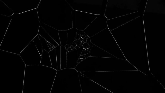 Breaking glass motion graphics. breaking glass on transparent background. Popup design element for videos and clips. Broken glass with cracks on transparent background. Cracked glass fracture effect