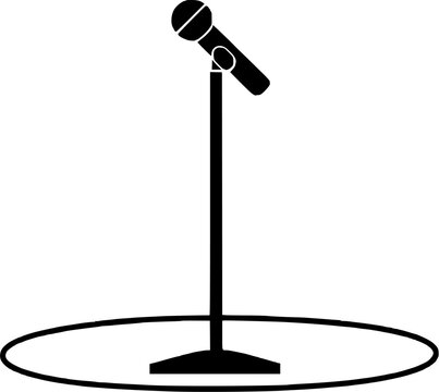 The theatrical stage features a sleek, black microphone stand with a circular spotlight base, perfectly positioned for a solo performance or monologue