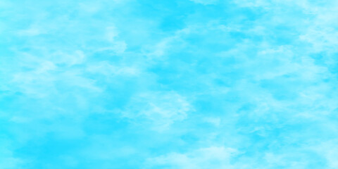 Obraz premium Soft white clouds scattered across a bright blue summer sky background texture, blurred and grainy Blue powder explosion on white background, Classic hand painted Blue watercolor background. 