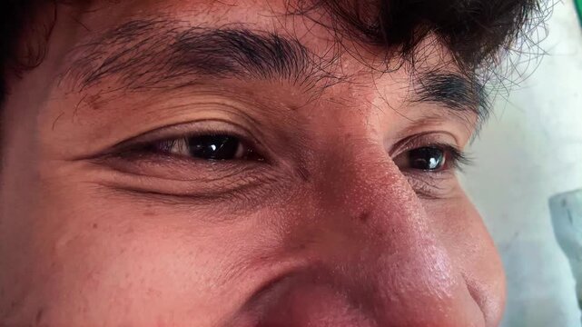 Macro Video of Smiling Human Eyes with Genuine Expression and Crow's Feet
