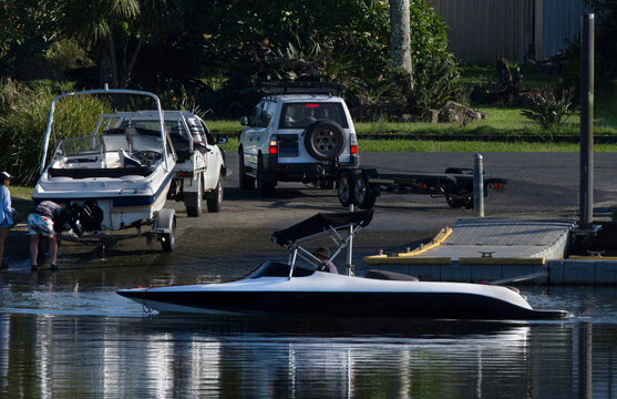 launching boats at a busy boat ramp