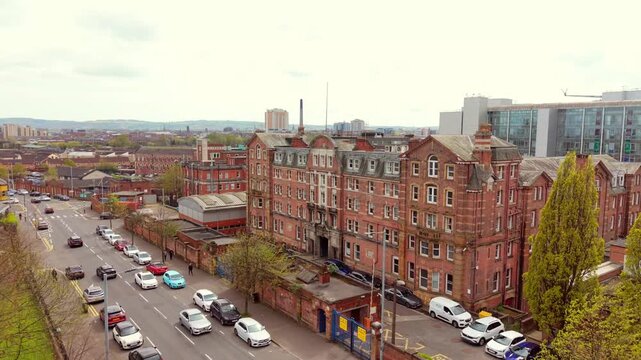 Front-on reversing 4K 60FPS aerial video of Belfast Royal Victoria Hospital on the Falls Road, Belfast in Northern Ireland. Produced with Rec709 color.