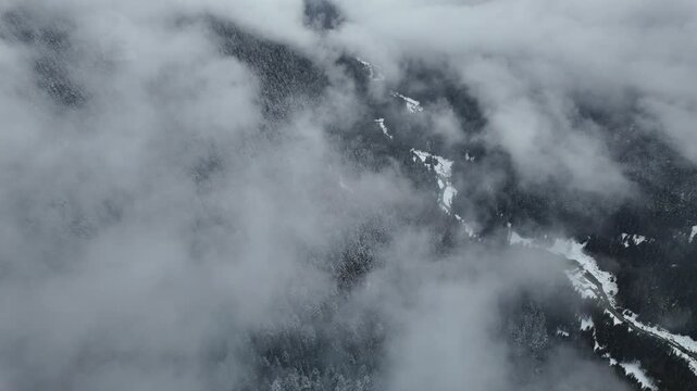 Beautiful snow scenery high above the mountain ski resort of Whistler, BC, Canada. Aerial birds eye view from the PEAK 2 PEAK tricable gondola.