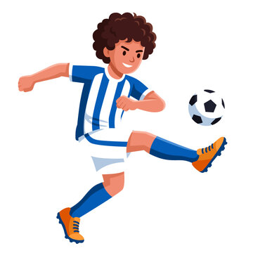 Young boy kicking soccer ball
