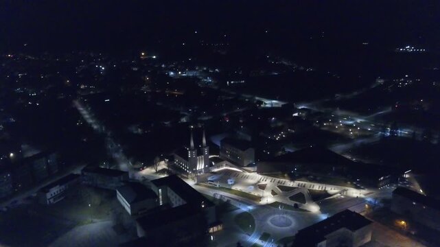 Drone night panorama from Ukuaru area looking toward illuminated Rakvere city centre.