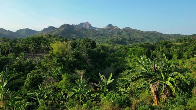 Front view approaching the scenic mountain and rolling green hills in Mt. Batulao, Balayan, Batangas, Philippines showcasing tropical landscape, hiking trails, and peaceful countryside views.