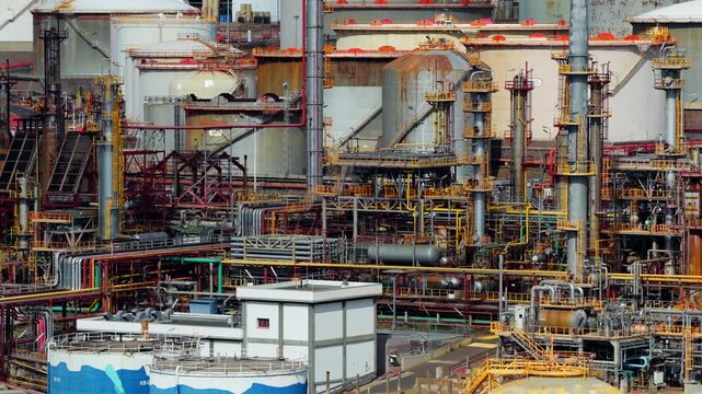 Close-up of Oil Refinery Pipelines; Global Energy Crisis and Fuel Supply Chain Disruptions