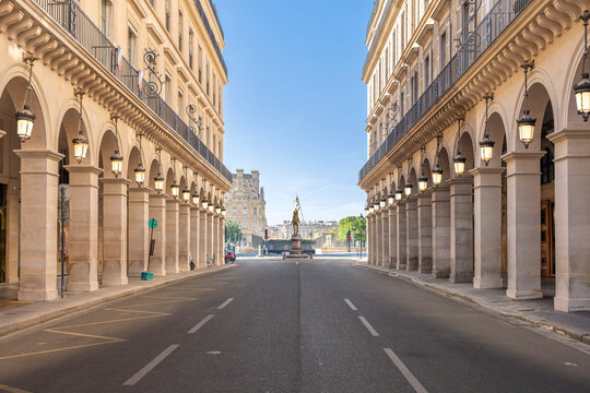 Paris - France,France - 04 25 2026: View of The Gilded bronze statue of Joan of Arc from Pyramids street with its arcades in backlight and blue sunny sky