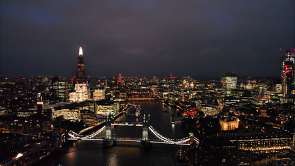 Fototapeta premium London skyline at night with tower bridge and the shard