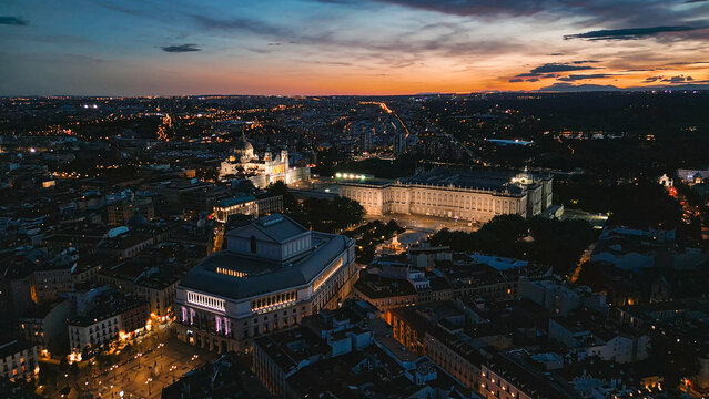 Madrid skyline at dusk showing royal palace teatro real