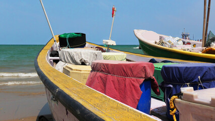 Colorful fishing boats anchored off the coast of Kanyakumari, Tamil Nadu, India © Reji VR