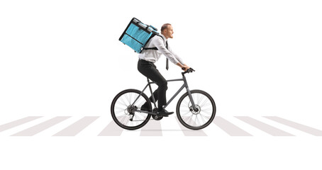 Obraz premium Businessman riding a bicycle and delivering food