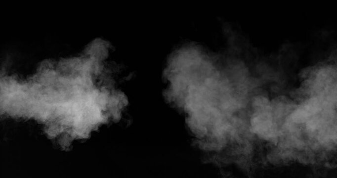 Super slow motion smoke spreading, captured at 500 fps with a high-speed camera. Expanding cloud of smoke, isolated on black background. Ideal as realistic VFX overlay.