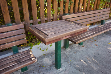 Fototapeta premium Benches with a table on a pedestrian street.