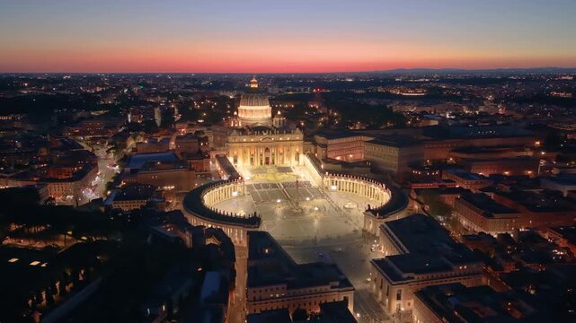 Aerial city view St. Peter's basilica in Rome, aerial shot at sunset with drone. San Pietro, Roma. 