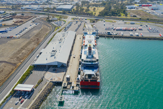 Aerial view of a passenger ferry at a shipping terminal