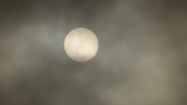 Sun and dust clouds of kalima in a cloudy day
