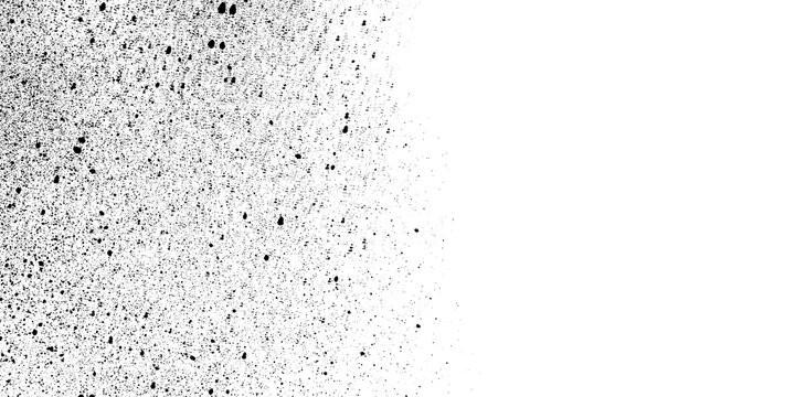 Black particles exploding on white background