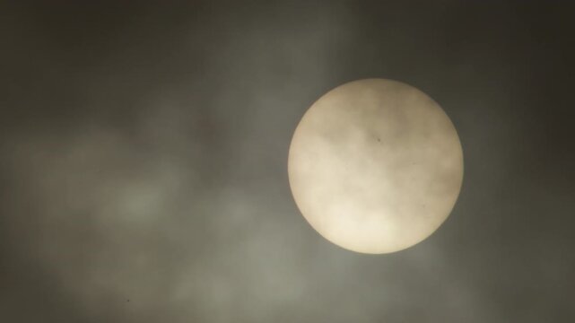 Sun and Dust clouds of calima or kalima in a cloudy day