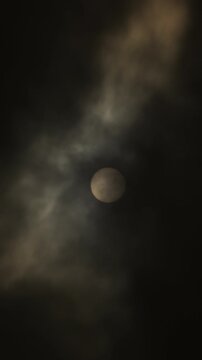 Sun with clouds of calima or kalima. 4K Vertical
