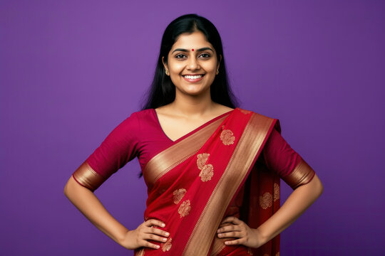 Portrait of a beautiful Indian woman wearing a traditional red saree