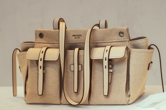 Route canvas and leather crossbody shopping bag with the Prada logo printed on the front. Milan, Italy, 15 April 2026