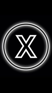 Neon glow letter X inside double circle on black background. Letter X alphabet typography. Shining neon X enclosed in dual animated circles with gentle motion and radiant shining effect.