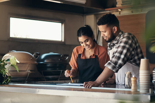 Waitress, team and documents with people in cafe for small business, menu planning and startup. Entrepreneur, restaurant shift roster and hospitality with man and woman at coffee shop for catering