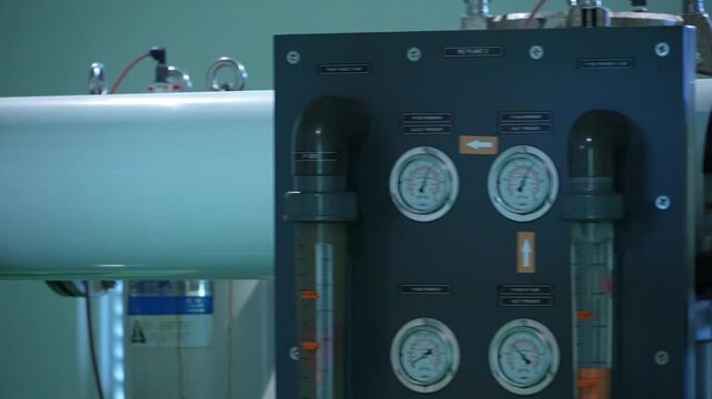 Industrial water filtration system with pressure gauges and flow meters for purification processes and quality control in manufacturing