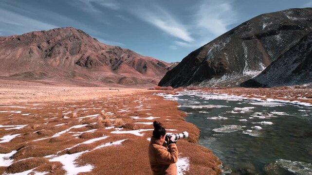 Female Photography By Icy Stream in Altai Mountain Region of Mongolia