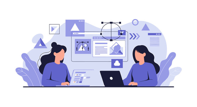 Two female graphic designers collaborating on a web design project.