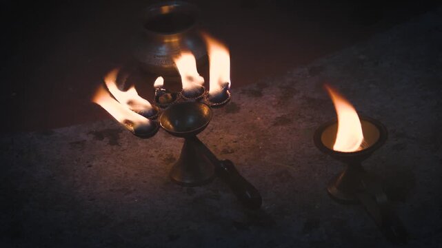 Pancha pradeep or Traditional oil lamps burning during puja of Diwali festival celebration in India