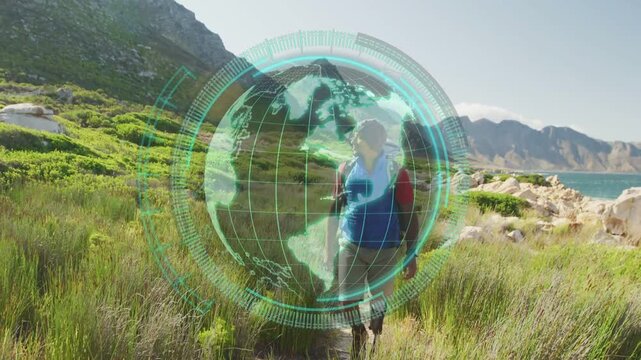 Globe appearing rotating over male hiker walking trail toward camera with backpack exploring travel