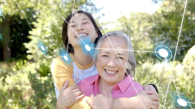 Animated network nodes fading causing mother-daughter hugging smiling laughing showing family tie