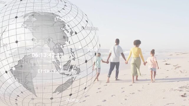 Family walking on beach, initiating globe spinning at left, leaving footprints for travel