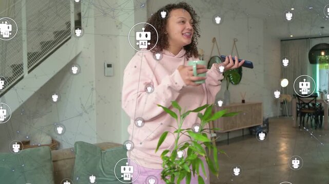 Adult woman sipping mug and speaking into phone, controlling home tech while AI icons hovering