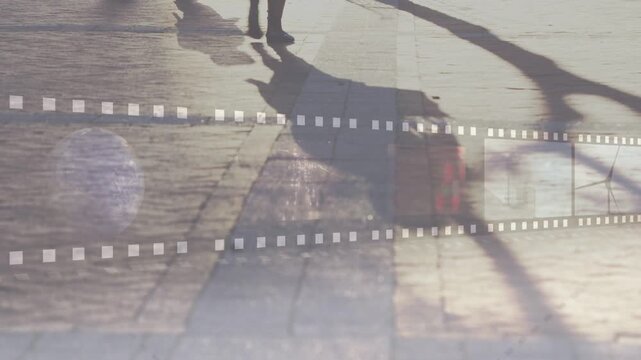 Walker stepping across tiles, causing film strip scrolling and showing plane energy frames for tech
