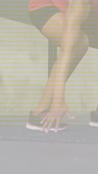 Vertical video: Woman entering path, warming up for fitness, adjusting shoe, scan lines overlaying