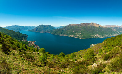 Obraz premium Panorama of Lake Como, with Tremezzina, Villa Balbianello, a glimpse of Lake Lugano, photographed from Alpe Camaggiore. 