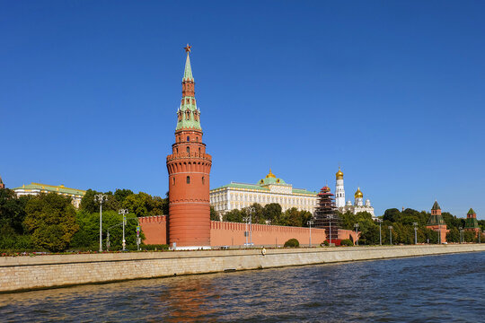 The Vodovzvodnaya Tower and the Grand Kremlin Palace on the Kremlin Embankment of Moscow river.