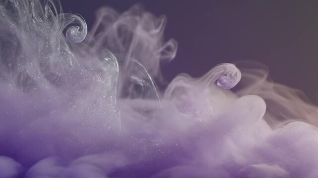 Smoke swirls and rises in a purple cloud formation against a dark background