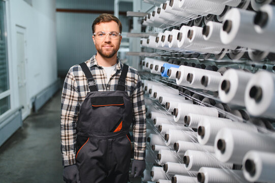 Worker smiling in polypropylene yarn manufacturing factory