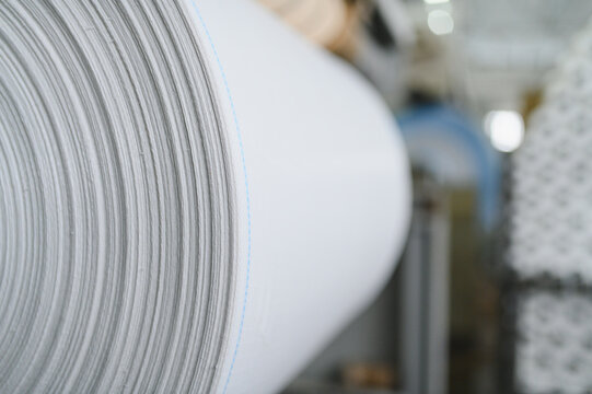 White polypropylene fabric roll during industrial production