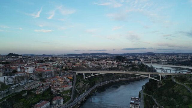 4K Aerial View of Porto, Portugal and Ponte do Infante Arch Bridge Over the Douro River