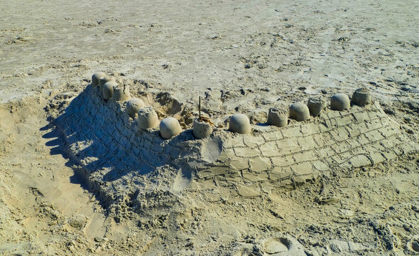 Sandburg an Strand