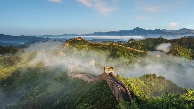Timelapse of the Jinshanling Great Wall at sunrise, showcasing mist rising over the ancient wall and mountainous landscape in Chengde, Hebei, China.